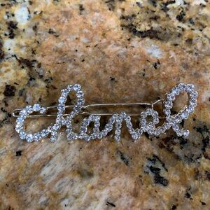 Absolutely stunning Chanel hair clip with Crystals in writing Chanel ,must have!